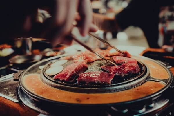 Japanese yakiniku restaurant with premium tabletop grill and low-profile exhaust hood