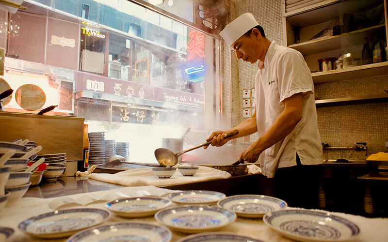 Chinese wok kitchen with heavy grease smoke requiring ESP exhaust purification