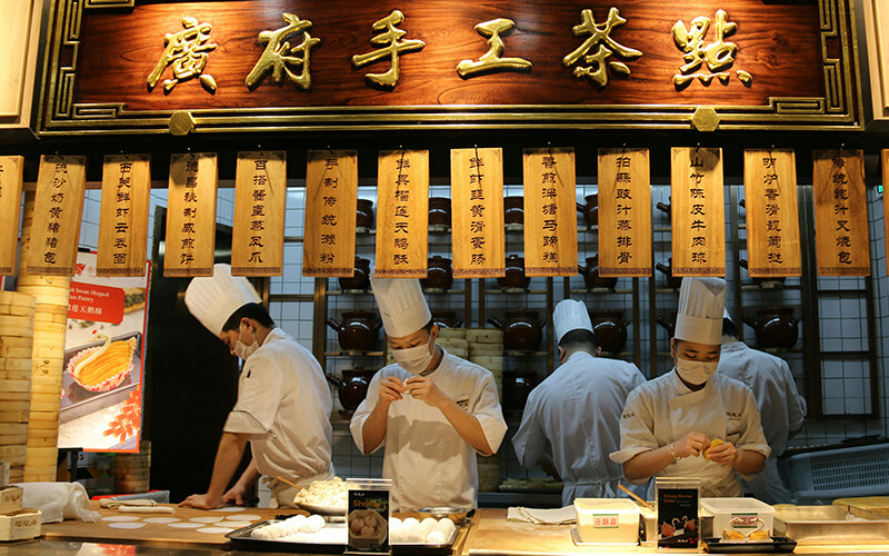 Premium food hall with artisanal open kitchens and invisible ESP purification system