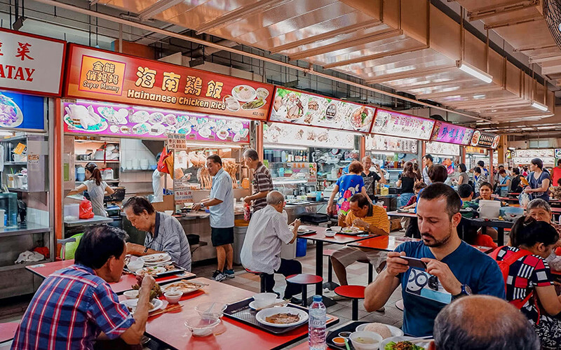 Shopping mall inline food court with 30+ stalls sharing centralized ESP exhaust shaft